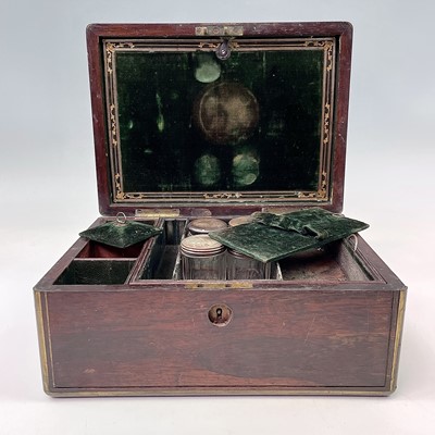 Lot 159 - A Regency rosewood and brass bound campaign...