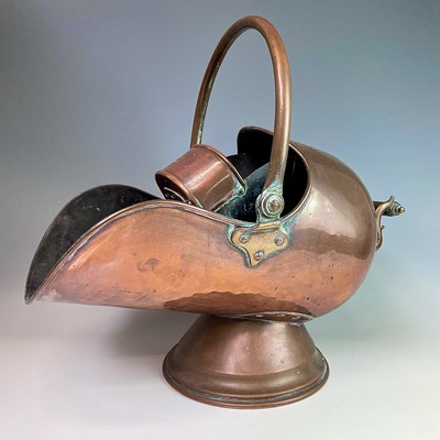 Lot 133 - A Victorian copper coal helmet with associated...