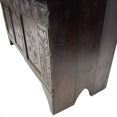 Lot 134 - An oak and pine coffer with carved triple...