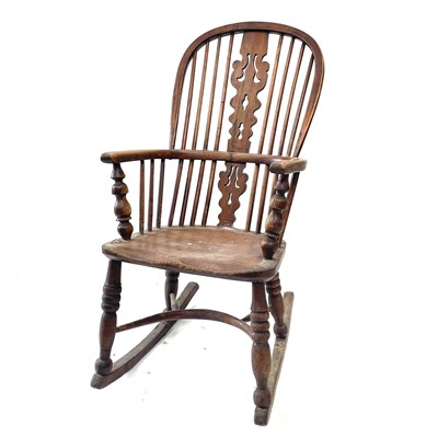 Lot 135 - A 19th century ash and elm Windsor elbow chair...