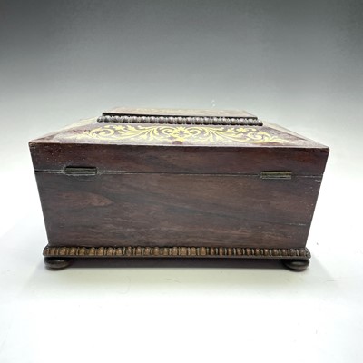Lot 162 - A Regency rosewood and cut brass inlaid...