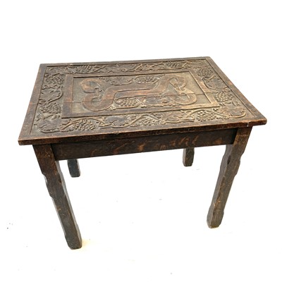 Lot - A George III oak cricket table, late 18th century
