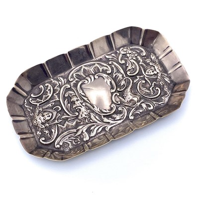 Lot 135 - A Victorian silver embossed pin tray by...