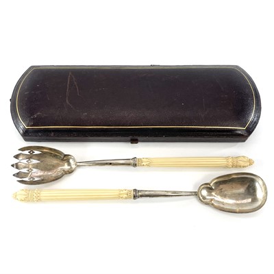 Lot 31 - A cased pair of Victorian silver serving...