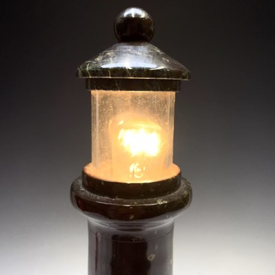 Lot 82 - A Cornish serpentine turned lighthouse lamp,...