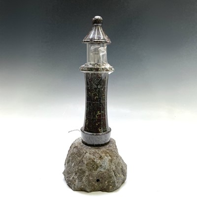 Lot 84 - A Cornish serpentine lighthouse table lamp,...