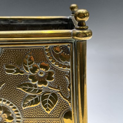 Lot 22 - A late Victorian small square embossed brass...