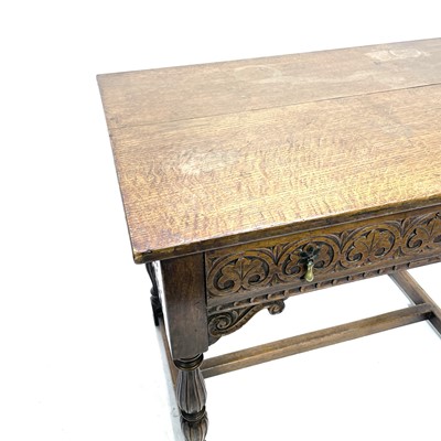 Lot 156 - A carved oak side table, circa 1900, with a...