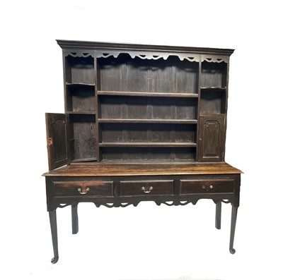 Lot 160 - A 19th century oak dresser, with three shelves...