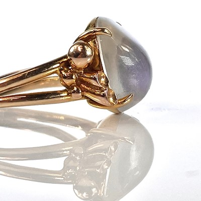 Lot 211 - A stylish 14K moonstone set cocktail ring, the...