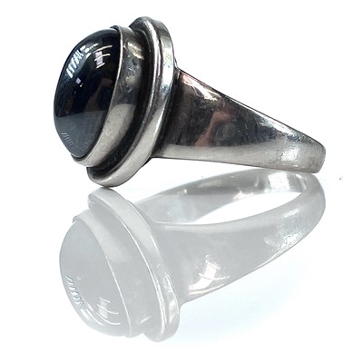 Lot 149 - A Georg Jensen silver and hematite ring,...