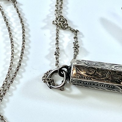 Lot 285 - A sterling silver foliate engraved combination...