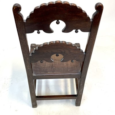 Lot 163 - A 17th century style Derbyshire oak backstool,...