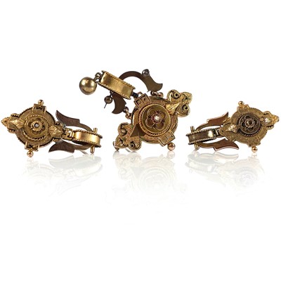 Lot 115 - A Victorian gold suite of three brooches, each...