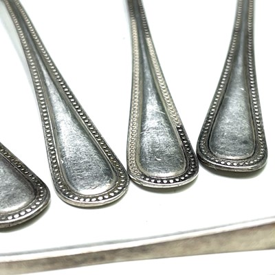 Lot 43 - A George V silver set of four tea spoons by...