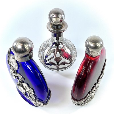 Lot 223 - A sterling silver overlay glass scent bottle...