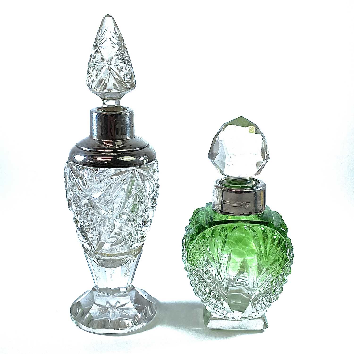 Lot 217 - An Art Deco green blush cut glass scent bottle...