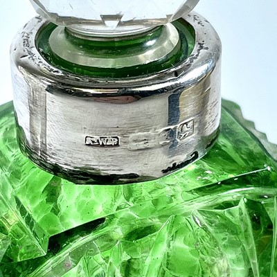 Lot 217 - An Art Deco green blush cut glass scent bottle...