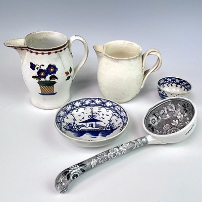 Lot 245 - A pearlware jug, circa 1800, height 8.5cm, a...