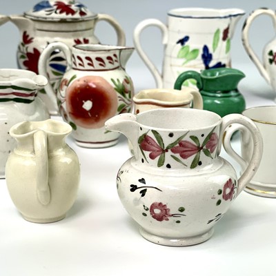 Lot 247 - Seven miniature pearlware and creamware jugs,...