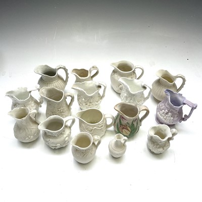 Lot 829 - Twelve Victorian miniature Parian jugs...