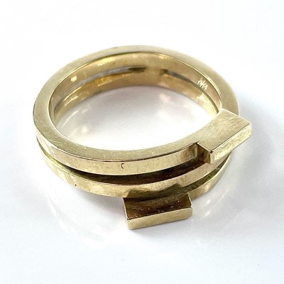 Lot 176 - A high purity gold abstract coiled ring, size...