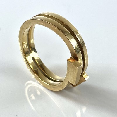 Lot 176 - A high purity gold abstract coiled ring, size...