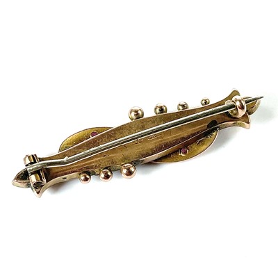 Lot 131 - A 9ct bar brooch set with two chip diamonds...