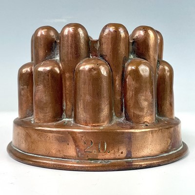 Lot 252 - A Victorian copper jelly mould, height 8cm,...