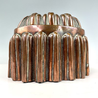 Lot 253 - A Victorian copper jelly mould, height 11.5cm,...