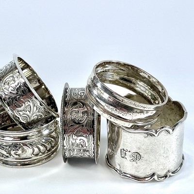 Lot 186 - A collection of eight silver hallmarked napkin...