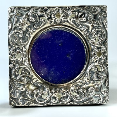 Lot 120 - An Edwardian embossed silver mounted small...