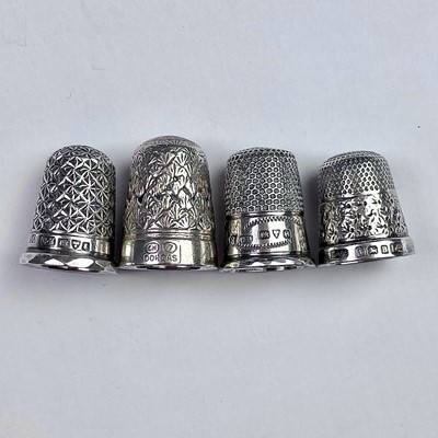 Lot 275 - An Edwardian silver thimble by Charles Horner,...