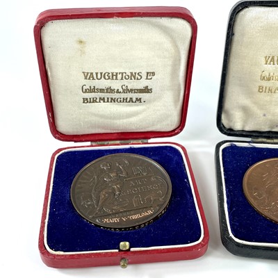 Lot 233 - A cased set of three bronze medallions by...