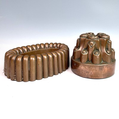 Lot 259 - Two Victorian copper jelly moulds, height 10cm,...