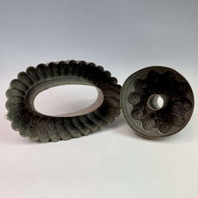 Lot 259 - Two Victorian copper jelly moulds, height 10cm,...