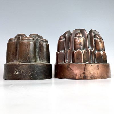 Lot 260 - Two Victorian copper jelly moulds, heights...