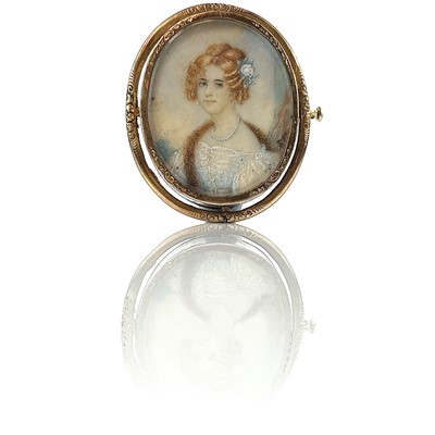 Lot 163 - A 19th century gold brooch set with an oval...