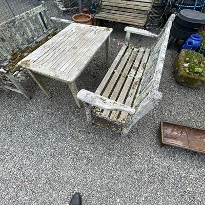 Lot 602 - A teak slatted garden bench height 89cm width...
