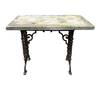 Lot 604 - A Victorian cast iron garden table with white...