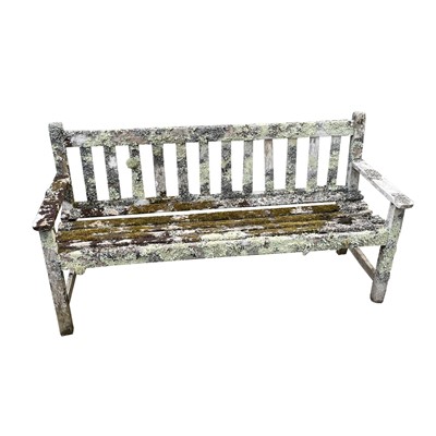 Lot 603 - A teak slatted Garden bench height 83cm width...