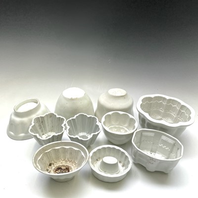 Lot 262 - Ten pottery jelly moulds, including a pair of...