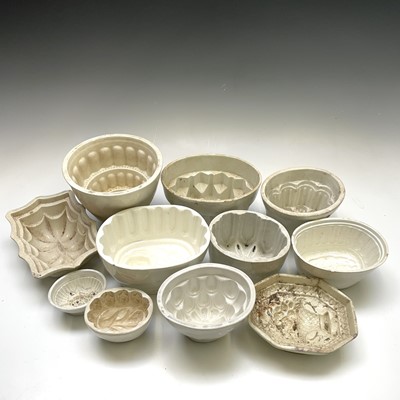 Lot 266 - Eleven pottery jelly moulds. (11)