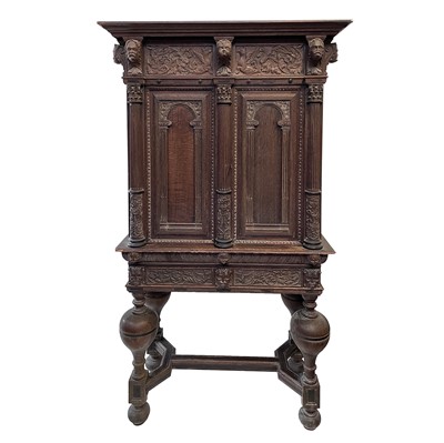 Lot 274 - A Flemish carved oak cabinet on stand, 19th...