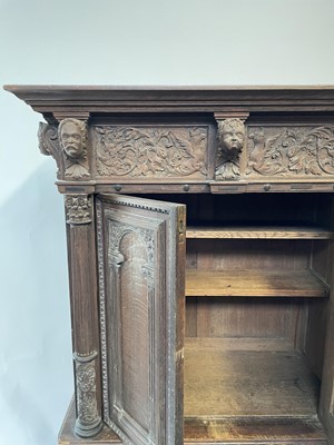 Lot 274 - A Flemish carved oak cabinet on stand, 19th...