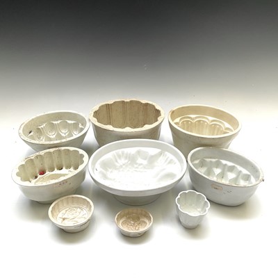 Lot 269 - Nine pottery jelly moulds. (9)