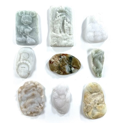 Lot 267 - A collection of jade and hardstone carvings...