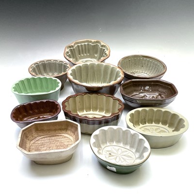Lot 271 - Eleven stoneware and pottery jelly moulds. (11)