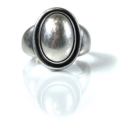 Lot 177 - A Georg Jensen silver ring, model no.46,...