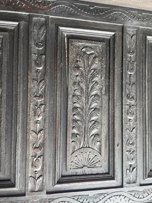 Lot 276 - A carved oak panel, dated 1721, the back part...
